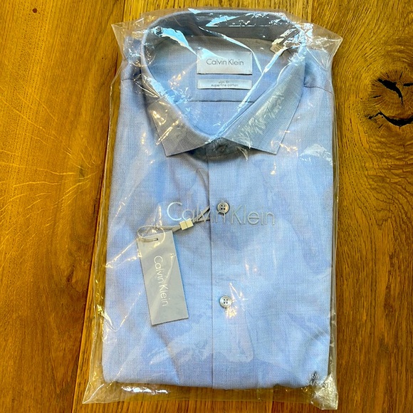 Calvin Klein, blue patterned shirt. - Picture 1 of 4